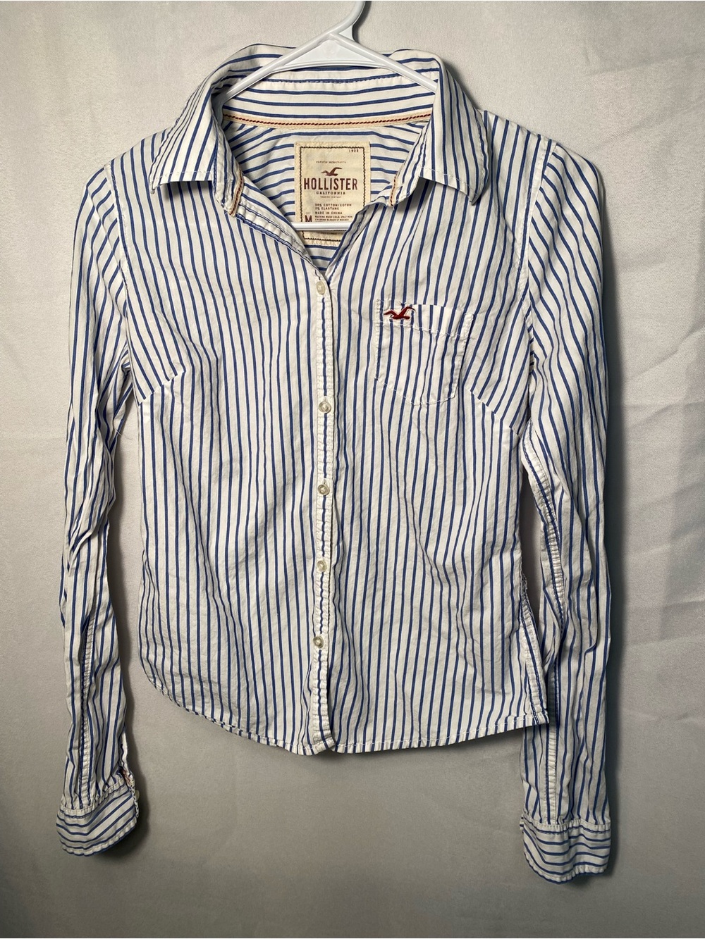 Y2K Hollister Woman’s White Button-Down Shirt with Blue Stripes